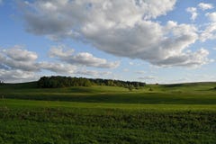 A beauty green hills under clouds stock photography A beauty green hills under clouds stock photography