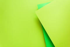 Green and lime pastel color papered background. Volume geometric flat lay. Top view. Copy space royalty free stock photo Green and lime pastel color papered background. Volume geometric flat lay. Top view. Copy space royalty free stock photo