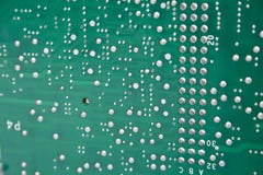 Green pcb. Charge of telecommunications equipment with visible elements of compounds royalty free stock photography Green pcb. Charge of telecommunications equipment with visible elements of compounds royalty free stock photography