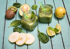 Green smoothie with avocado, spinach, lime, kiwi, and pear in a Stock Photography Green smoothie with avocado, spinach, lime, kiwi, and pear in a Stock Photography