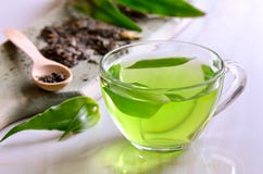 Green tea. Green herbal tea, warm relaxing aromatic antioxidant drink Green tea. Green herbal tea, warm relaxing aromatic antioxidant drink