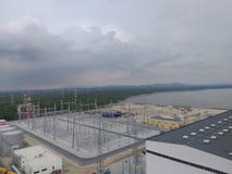 Grid station under Cloudy sky and sea view stock images Grid station under Cloudy sky and sea view stock images
