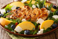 Grilled chicken breast with fresh peaches, blueberries, arugula Stock Photos Grilled chicken breast with fresh peaches, blueberries, arugula Stock Photos