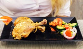 grilled chicken legs and vegetable salad stock images grilled chicken legs and vegetable salad stock images