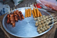 Grilled pork and chicken skewers for sale in Thailand stock image Grilled pork and chicken skewers for sale in Thailand stock image