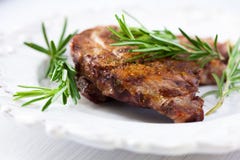 Grilled pork flavoured with rosemary stock image Grilled pork flavoured with rosemary stock image