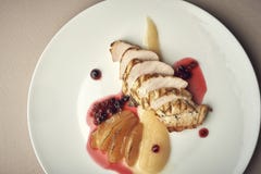Grilled pork tenderloin with pomegranate souce and potato royalty free stock photography Grilled pork tenderloin with pomegranate souce and potato royalty free stock photography