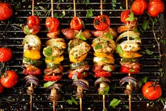 Grilled vegetable and meat skewers