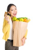 Grocery shopping female and credit card royalty free stock photography Grocery shopping female and credit card royalty free stock photography