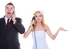 Groom and bride calling to each other stock photography Groom and bride calling to each other stock photography