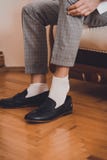 The groom sits on the wedding mornings stock image The groom sits on the wedding mornings stock image
