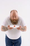 Gros type barbu choqué de son régime photos libres de droits Gros type barbu choqué de son régime photos libres de droits