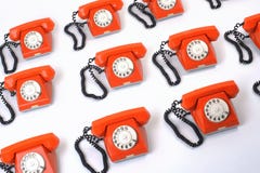 Grote groep oranje telefoons stock afbeelding Grote groep oranje telefoons stock afbeelding