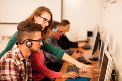 Group of adults learning computer skills. Intergenerational tran royalty free stock photo Group of adults learning computer skills. Intergenerational tran royalty free stock photo