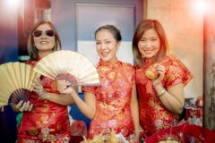 Group of asian woman wearing chinese tradition clothes toothy smiling face happiness emotion and hand sign i love you stock photography Group of asian woman wearing chinese tradition clothes toothy smiling face happiness emotion and hand sign i love you stock photography