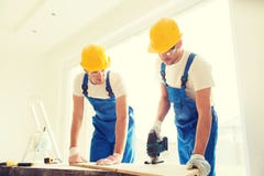 Group of builders with tools indoors royalty free stock photo Group of builders with tools indoors royalty free stock photo
