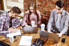 Group of casual business people working on new project .They using laptop and discuss about concept.Solving problems royalty free stock photos Group of casual business people working on new project .They using laptop and discuss about concept.Solving problems royalty free stock photos