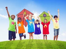 Group of Children Playing Kites Outdoors royalty free stock images Group of Children Playing Kites Outdoors royalty free stock images