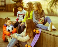 Group of children sitting on scaffolding schoolyard stock photography Group of children sitting on scaffolding schoolyard stock photography