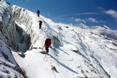 Group of climbers on rope on glacier Stock Photography Group of climbers on rope on glacier Stock Photography
