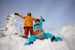Group of friends snowboarders having fun on the top of mountain royalty free stock photo Group of friends snowboarders having fun on the top of mountain royalty free stock photo