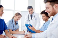Group of happy doctors meeting at hospital office royalty free stock photo Group of happy doctors meeting at hospital office royalty free stock photo