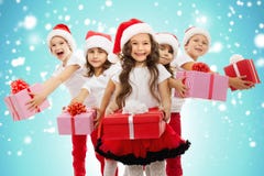 Group of happy kids in Christmas hat with presents royalty free stock image Group of happy kids in Christmas hat with presents royalty free stock image