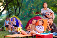 Group of happy kids on summer picnic stock photos Group of happy kids on summer picnic stock photos