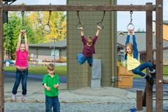 A group of kids on a playground Royalty Free Stock Photography A group of kids on a playground Royalty Free Stock Photography