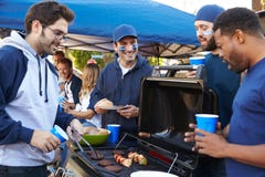 Group Of Male Sports Fans Tailgating In Stadium Car Park Stock Images Group Of Male Sports Fans Tailgating In Stadium Car Park Stock Images