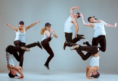 Group of men and women dancing hip hop choreography