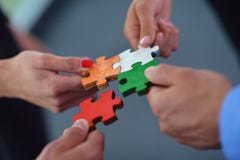 Group Of Business People Assembling Jigsaw Puzzle Royalty Free Stock Images Group Of Business People Assembling Jigsaw Puzzle Royalty Free Stock Images