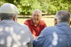 Group Of Senior Men Having Fun And Laughing In Park Stock Image Group Of Senior Men Having Fun And Laughing In Park Stock Image
