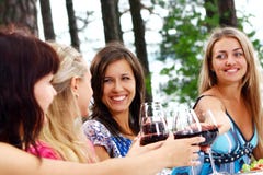 Group Of Young Womens Drinking Wine Stock Photo Group Of Young Womens Drinking Wine Stock Photo