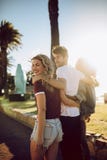 Young people enjoying a day at park Royalty Free Stock Photo Young people enjoying a day at park Royalty Free Stock Photo