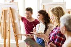 Group of young artists painting at art school Royalty Free Stock Photos Group of young artists painting at art school Royalty Free Stock Photos