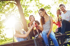 Group of young people cheering, having fun stock photo Group of young people cheering, having fun stock photo
