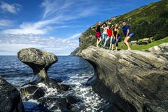 Group of young people is travelling around the Norway stock photography Group of young people is travelling around the Norway stock photography