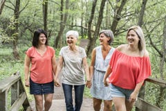 Groupe of women sister together with her senior mother stock photo Groupe of women sister together with her senior mother stock photo
