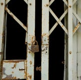 Grunge Padlock And Old Metal Door Royalty Free Stock Image