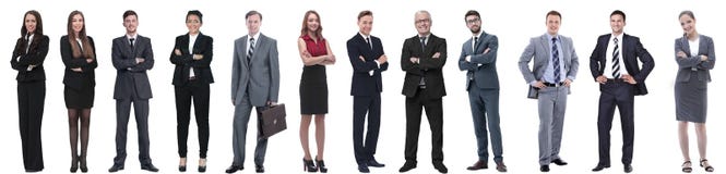 Grupo de executivos bem sucedidos isolados no branco fotografia de stock Grupo de executivos bem sucedidos isolados no branco fotografia de stock