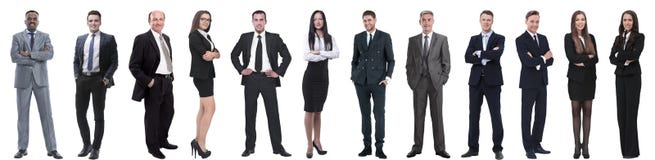 Grupo de executivos bem sucedidos isolados no branco imagem de stock Grupo de executivos bem sucedidos isolados no branco imagem de stock