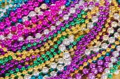 Grânulos de Mardi Gras fotos de stock Grânulos de Mardi Gras fotos de stock