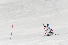GUDAURI, GEORGIA - MARCH 28, 2015: Georgian skier performs at slalom champion of Georgia Stock Images GUDAURI, GEORGIA - MARCH 28, 2015: Georgian skier performs at slalom champion of Georgia Stock Images