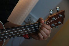 Guitar room finger woman play stock images Guitar room finger woman play stock images