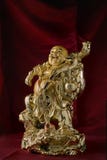 Guld- skratta Buddha av fengshuien royaltyfri bild Guld- skratta Buddha av fengshuien royaltyfri bild