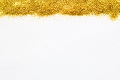 Guld som upptill blänker paljetter av bakgrunden royaltyfri foto Guld som upptill blänker paljetter av bakgrunden royaltyfri foto