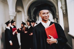 Guy. Mantle. University. Classmates. Cheerful. stock images Guy. Mantle. University. Classmates. Cheerful. stock images