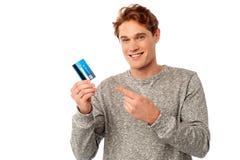 Guy pointing at his credit card Royalty Free Stock Photos Guy pointing at his credit card Royalty Free Stock Photos
