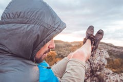 Guy resting in the mountains.Mountaineer observing the landscape royalty free stock images Guy resting in the mountains.Mountaineer observing the landscape royalty free stock images